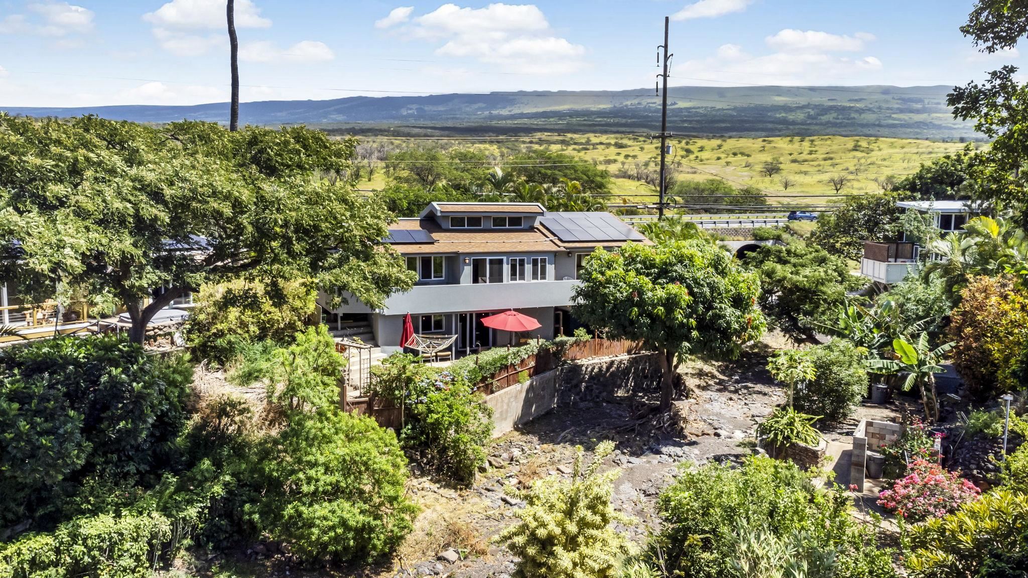 2670 Kanakanui Road Kihei, HI 96753 - Photo 41 of 41 a view of a swimming pool with a garden