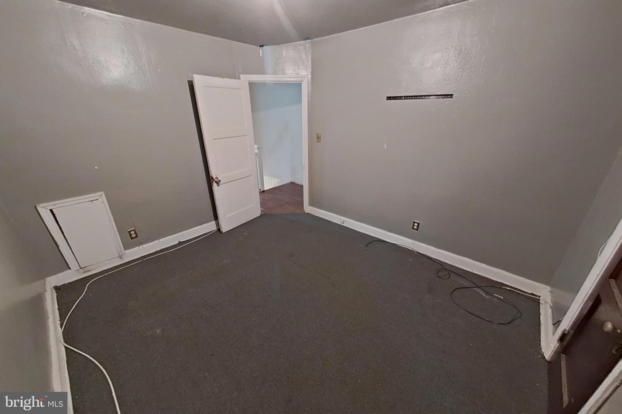 3716 Flowerton Road Baltimore, MD 21229 - Photo 13 of 21 an empty room with windows