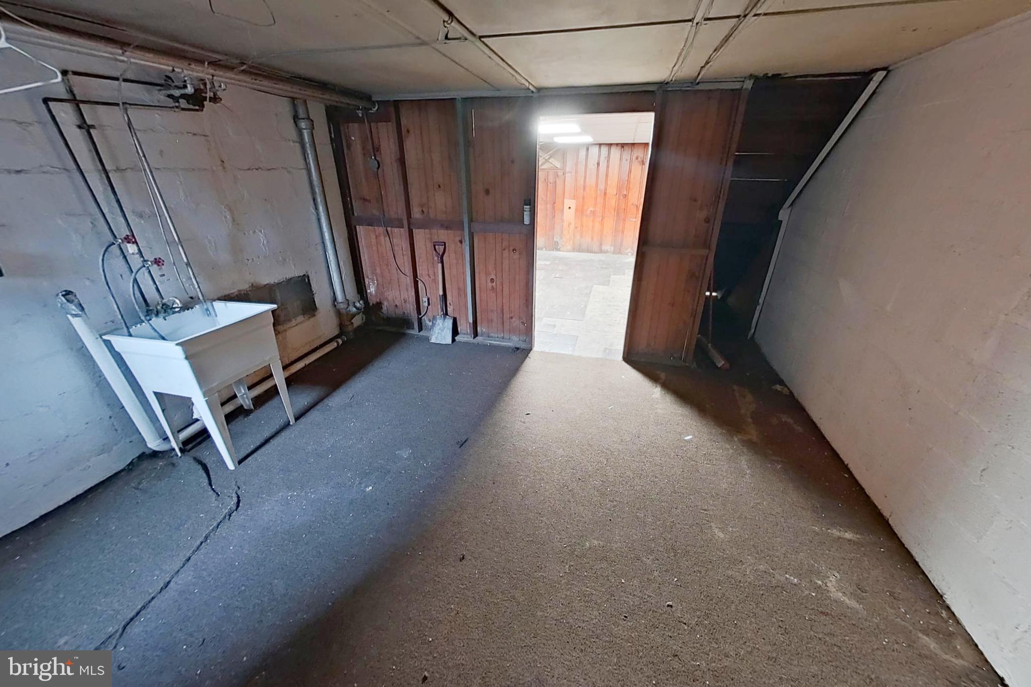 3716 Flowerton Road Baltimore, MD 21229 - Photo 19 of 21 a view of a room with a garage