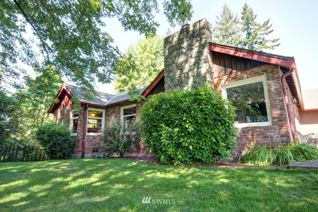6294 Mission Road Bellingham, WA 98226 - Photo 2 of 25 a view of a house with a yard
