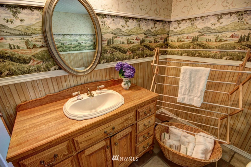 6294 Mission Road Bellingham, WA 98226 - Photo 12 of 25 a bathroom with a sink and a mirror