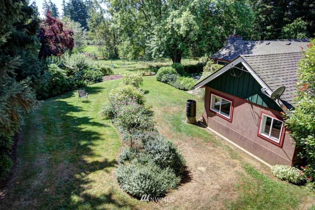 6294 Mission Road Bellingham, WA 98226 - Photo 20 of 25 a aerial view of a house with a yard