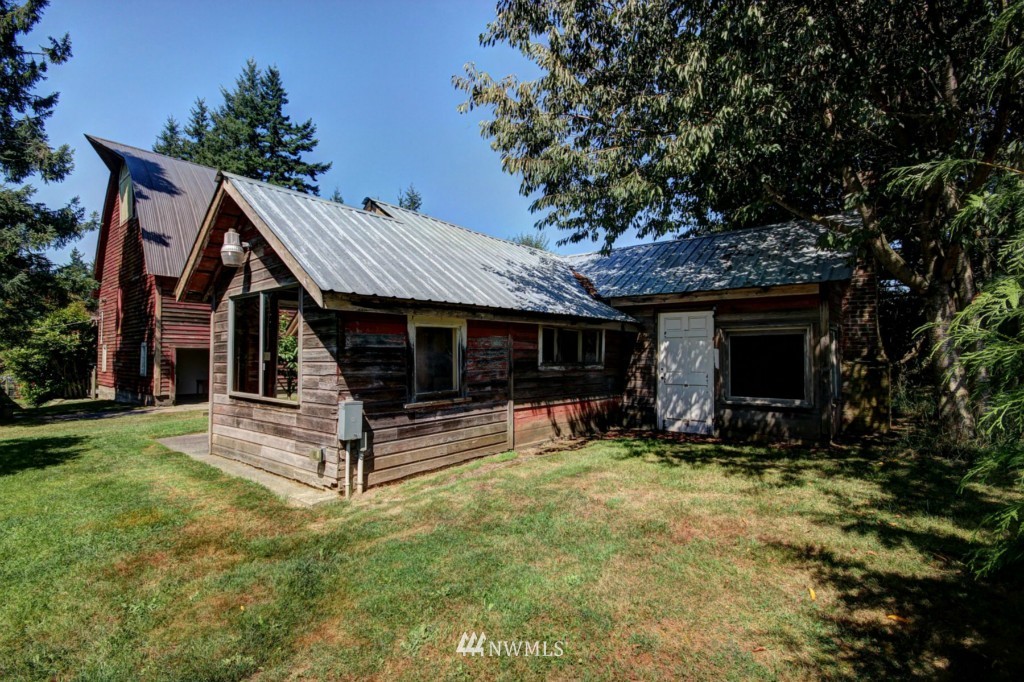6294 Mission Road Bellingham, WA 98226 - Photo 24 of 25 a view of a house with backyard and sitting area