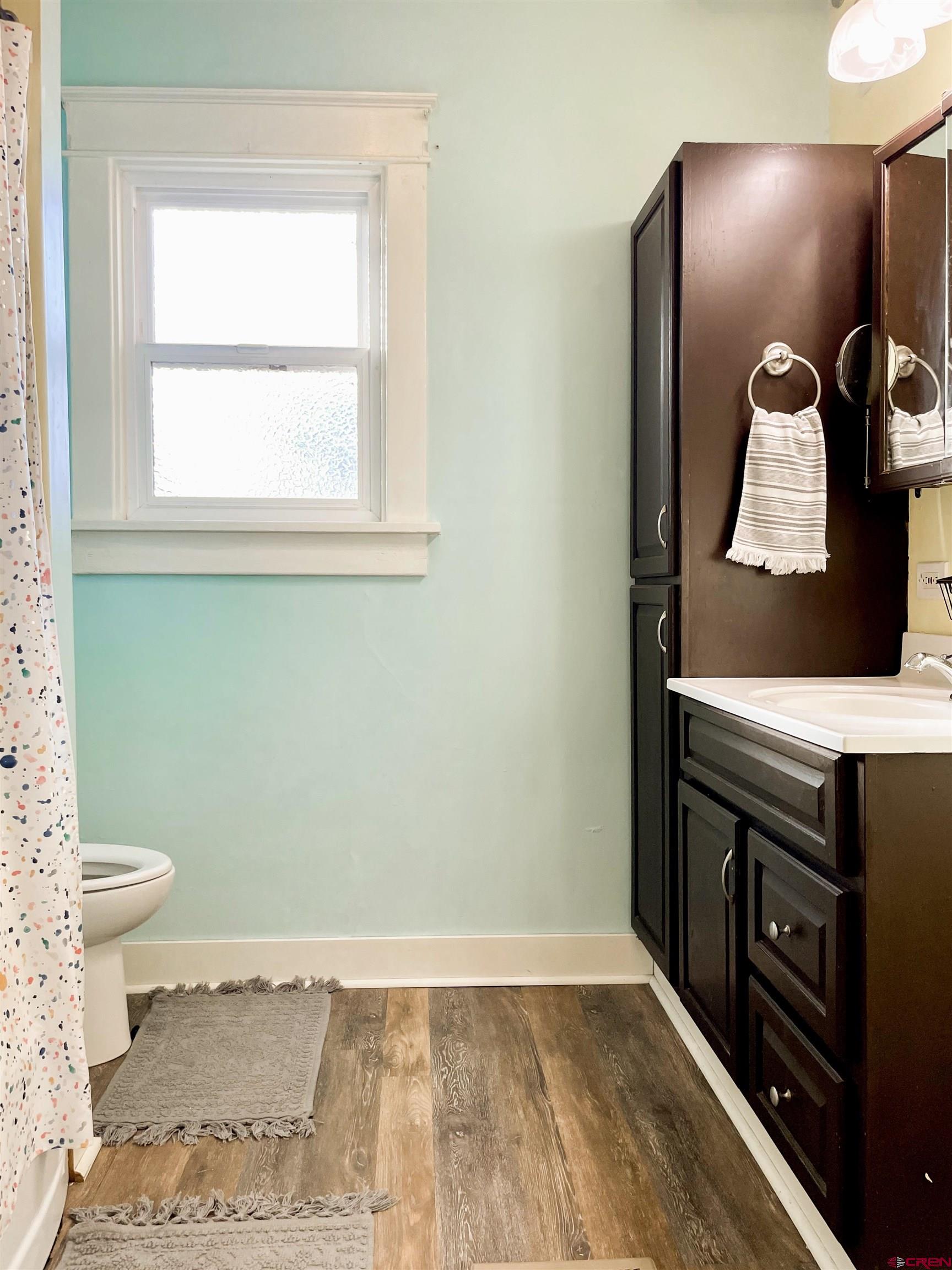 19643 H Road Delta, CO 81416 - Photo 19 of 35 a bathroom with a sink and a toilet