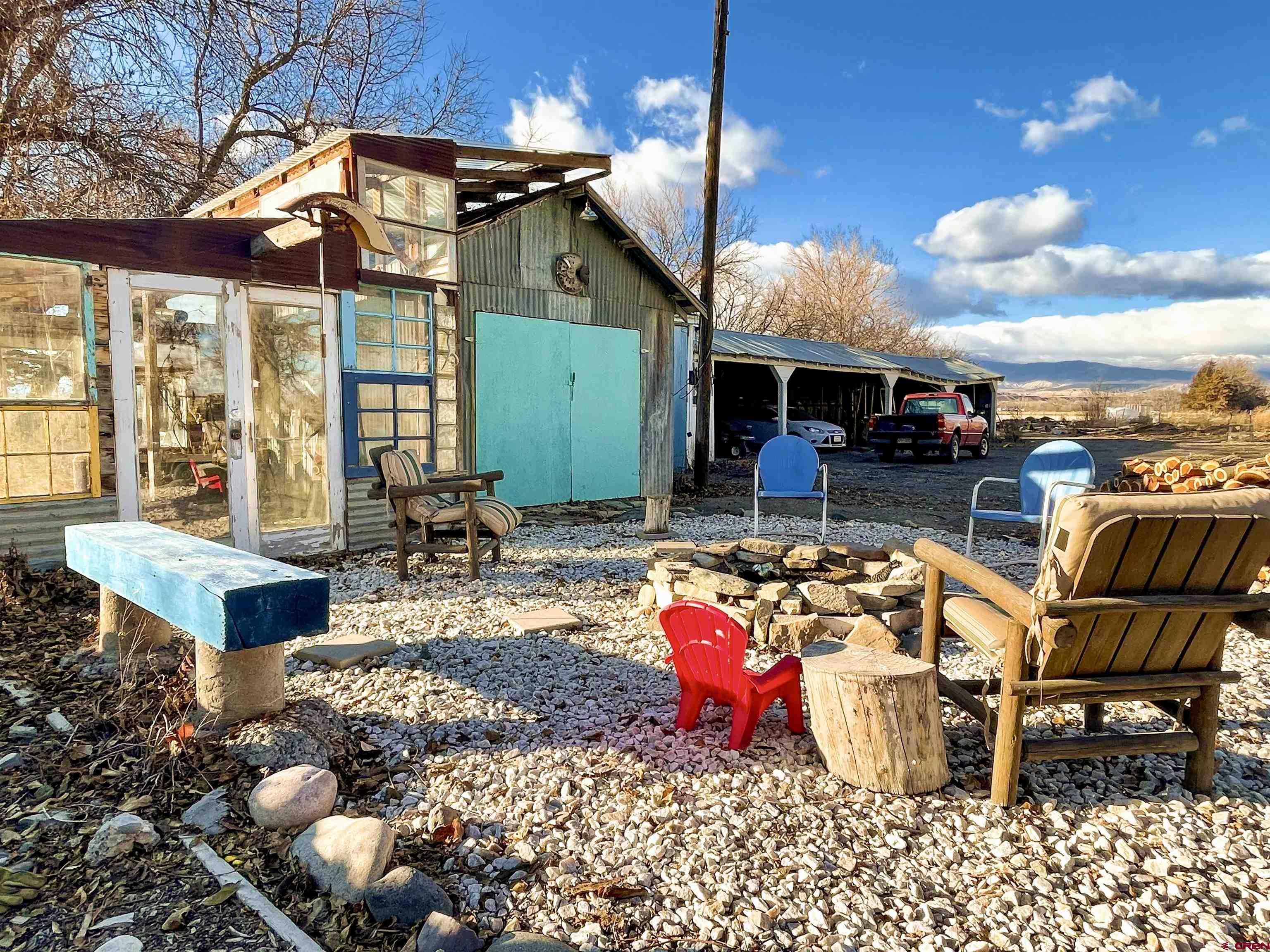 19643 H Road Delta, CO 81416 - Photo 28 of 35 a view of a chairs and tables in patio