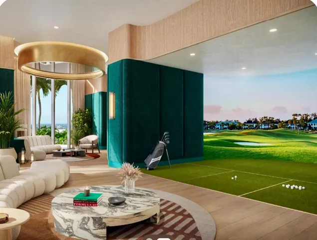 a living room with a table and a fireplace