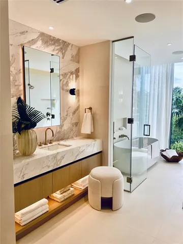 a bathroom with a double vanity sink and mirror