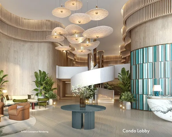 a living room with couches chandelier and a potted plant