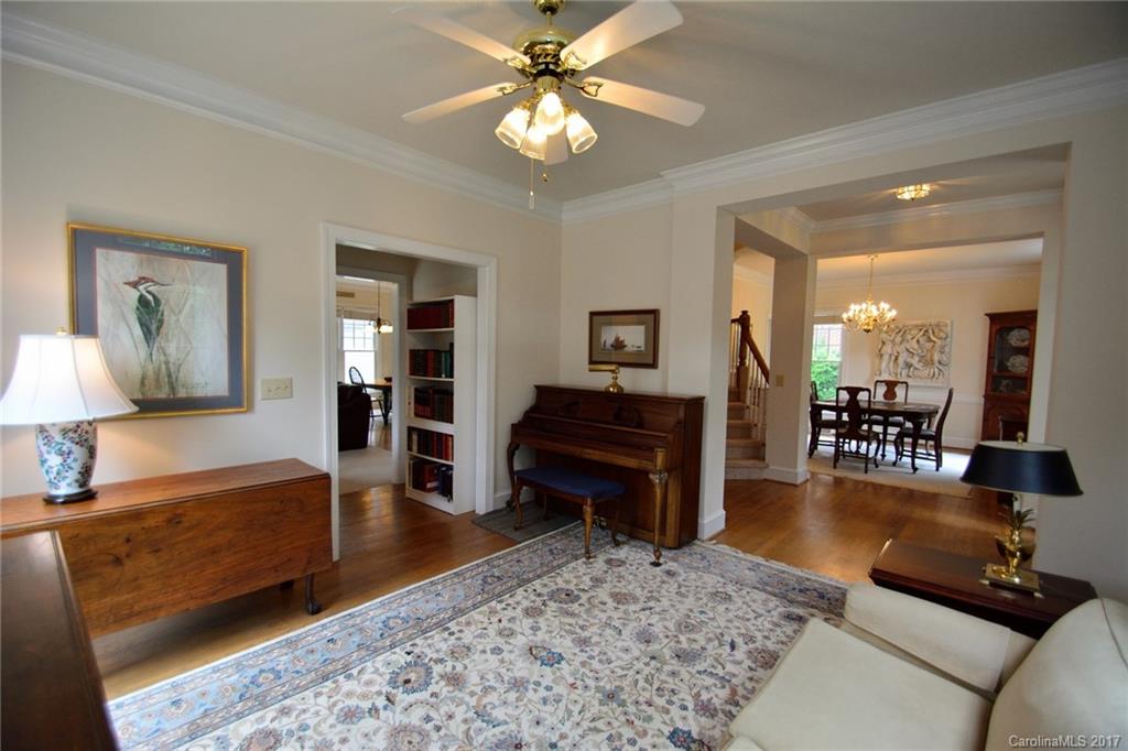 229 Kimberly Road Davidson, NC 28036 - Photo 3 of 23 a living room with furniture and a wooden floor