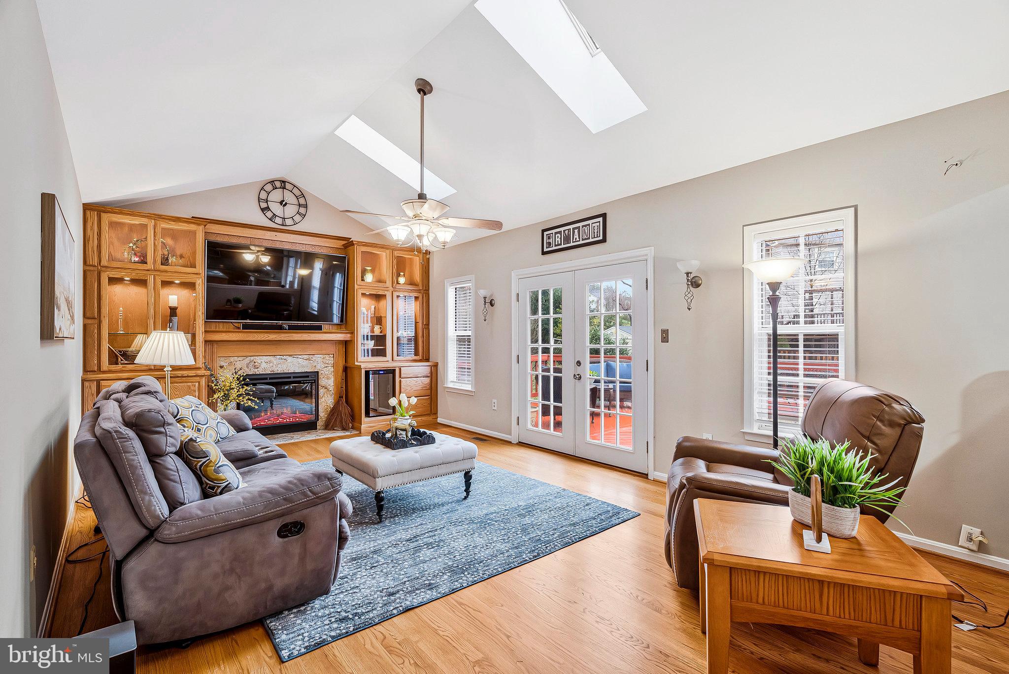 1545 Kingstream Circle Herndon, VA 20170 - Photo 19 of 71 Spacious family room with cozy electric fireplace