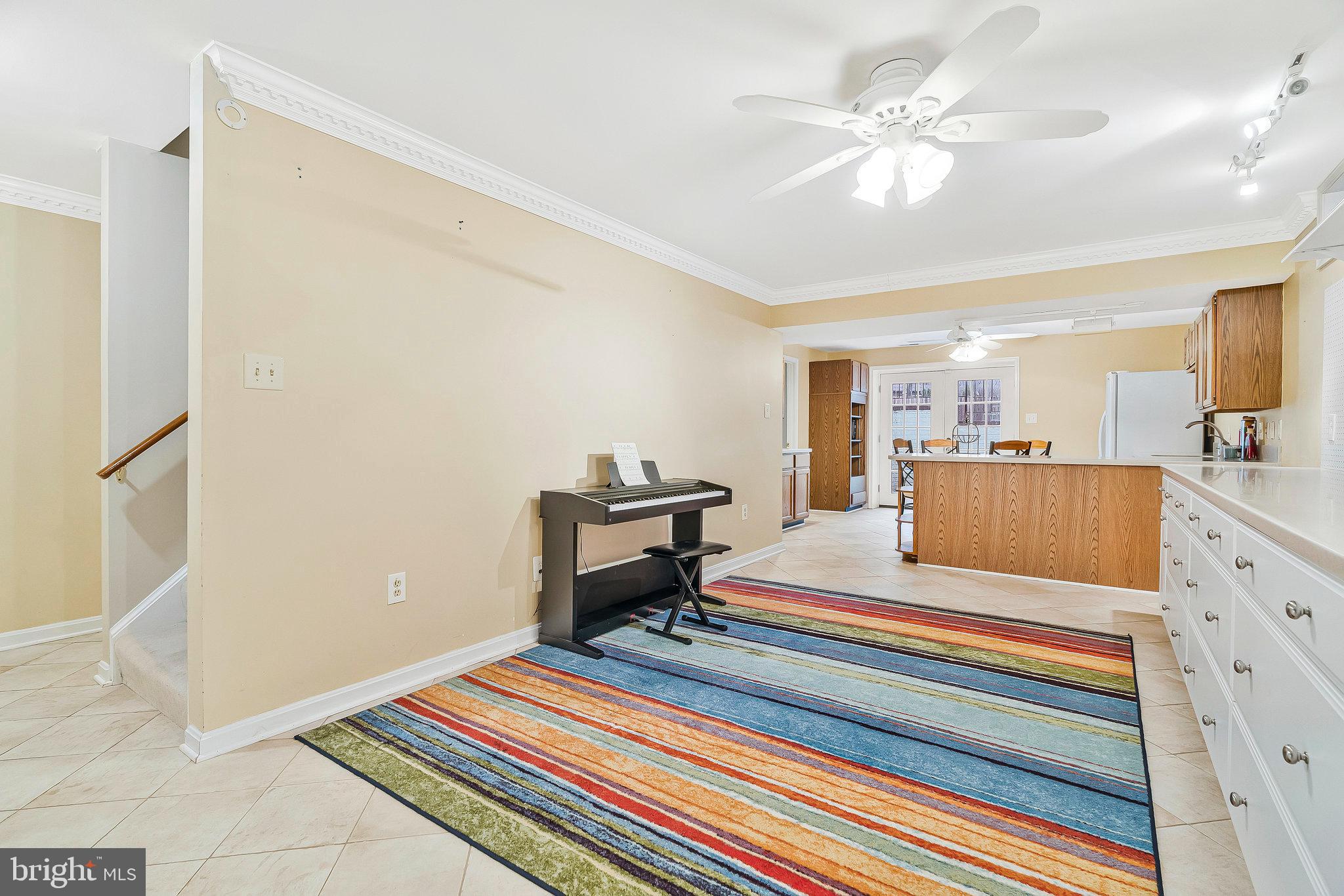 1545 Kingstream Circle Herndon, VA 20170 - Photo 47 of 71 a bedroom with a bed and a chandelier