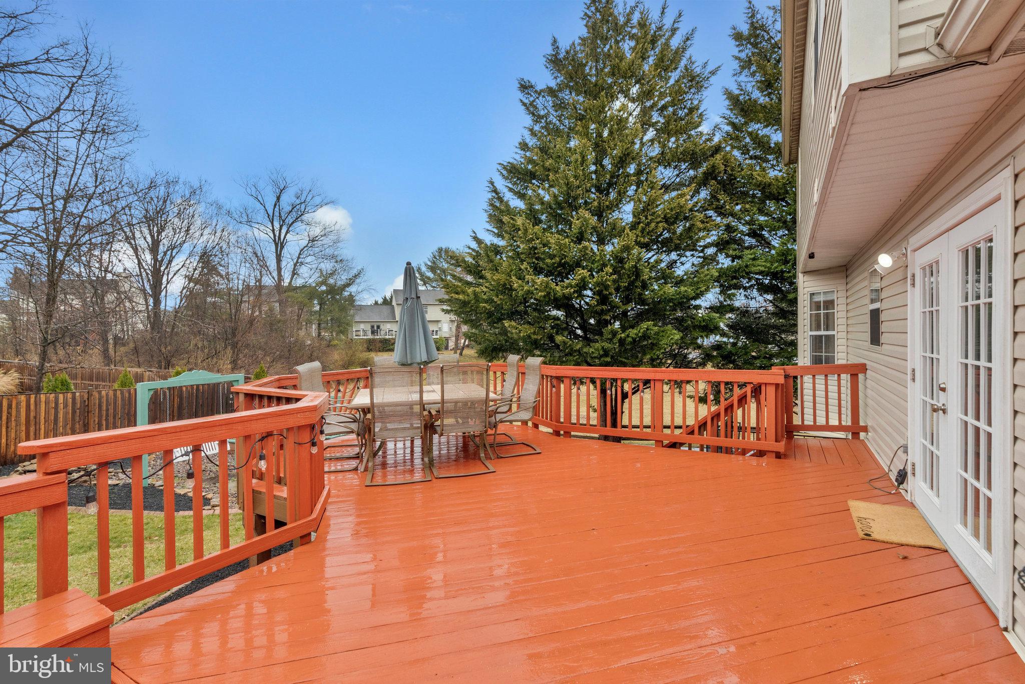 1545 Kingstream Circle Herndon, VA 20170 - Photo 56 of 71 a view of deck with chairs and wooden fence