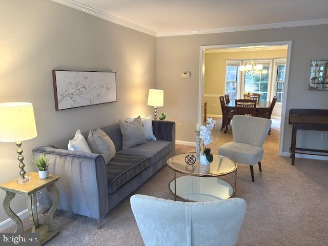 1545 Kingstream Circle Herndon, VA 20170 - Photo 8 of 71 a living room with furniture and a large window