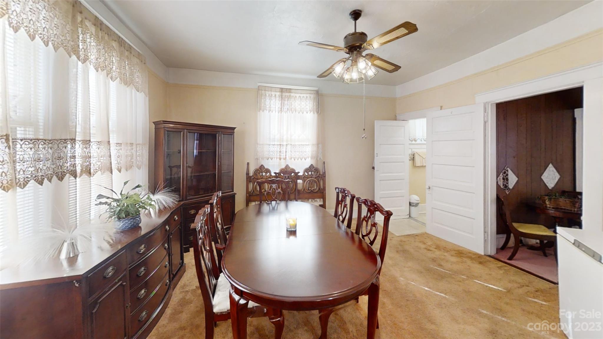182 Flint Street Asheville, NC 28801 - Photo 12 of 22 a dining room with furniture and window