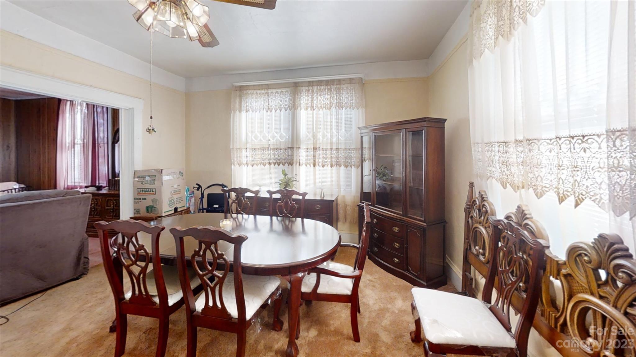 182 Flint Street Asheville, NC 28801 - Photo 13 of 22 a view of a dining room with furniture and window