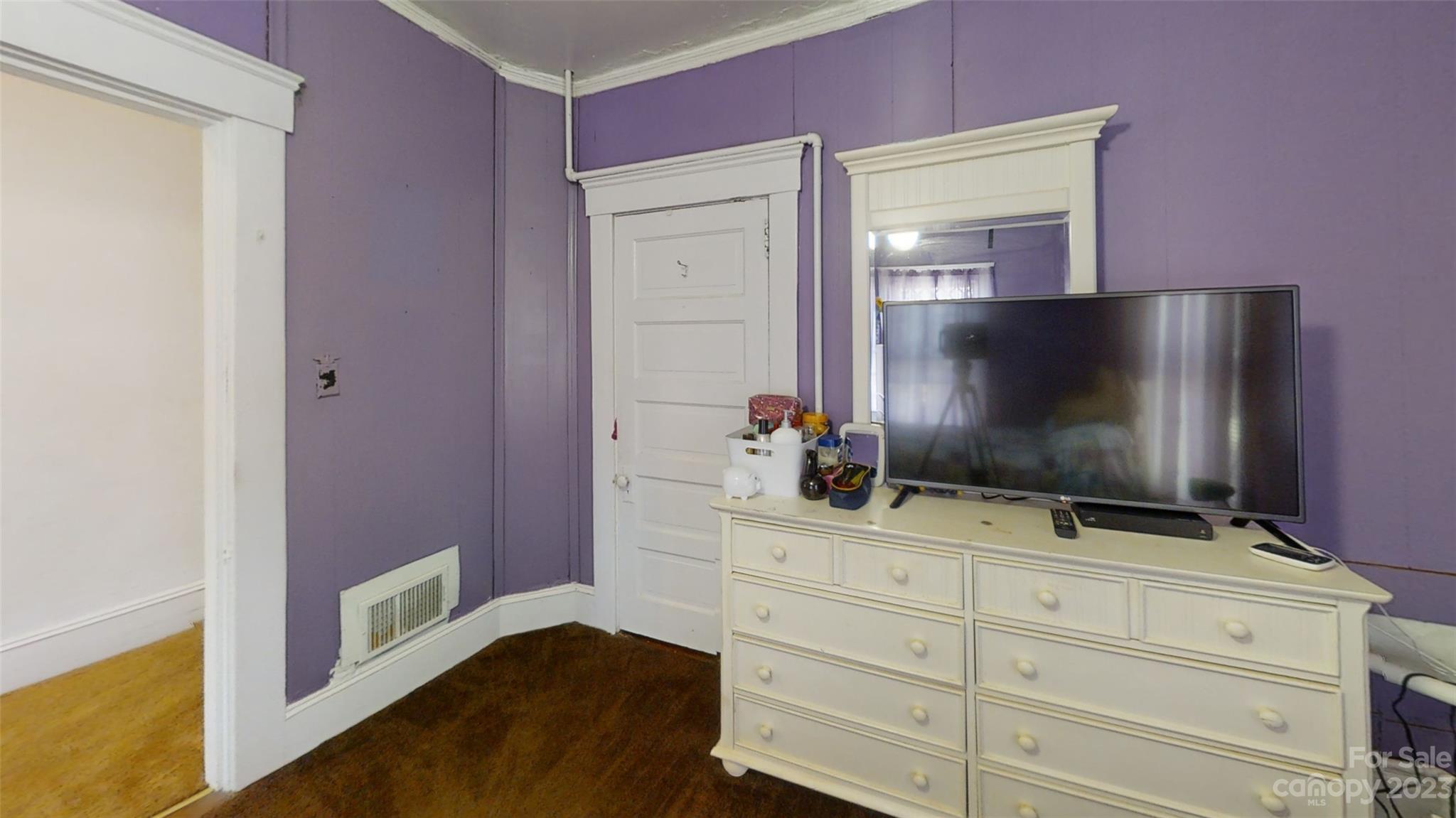182 Flint Street Asheville, NC 28801 - Photo 19 of 22 a bathroom with a sink and a mirror