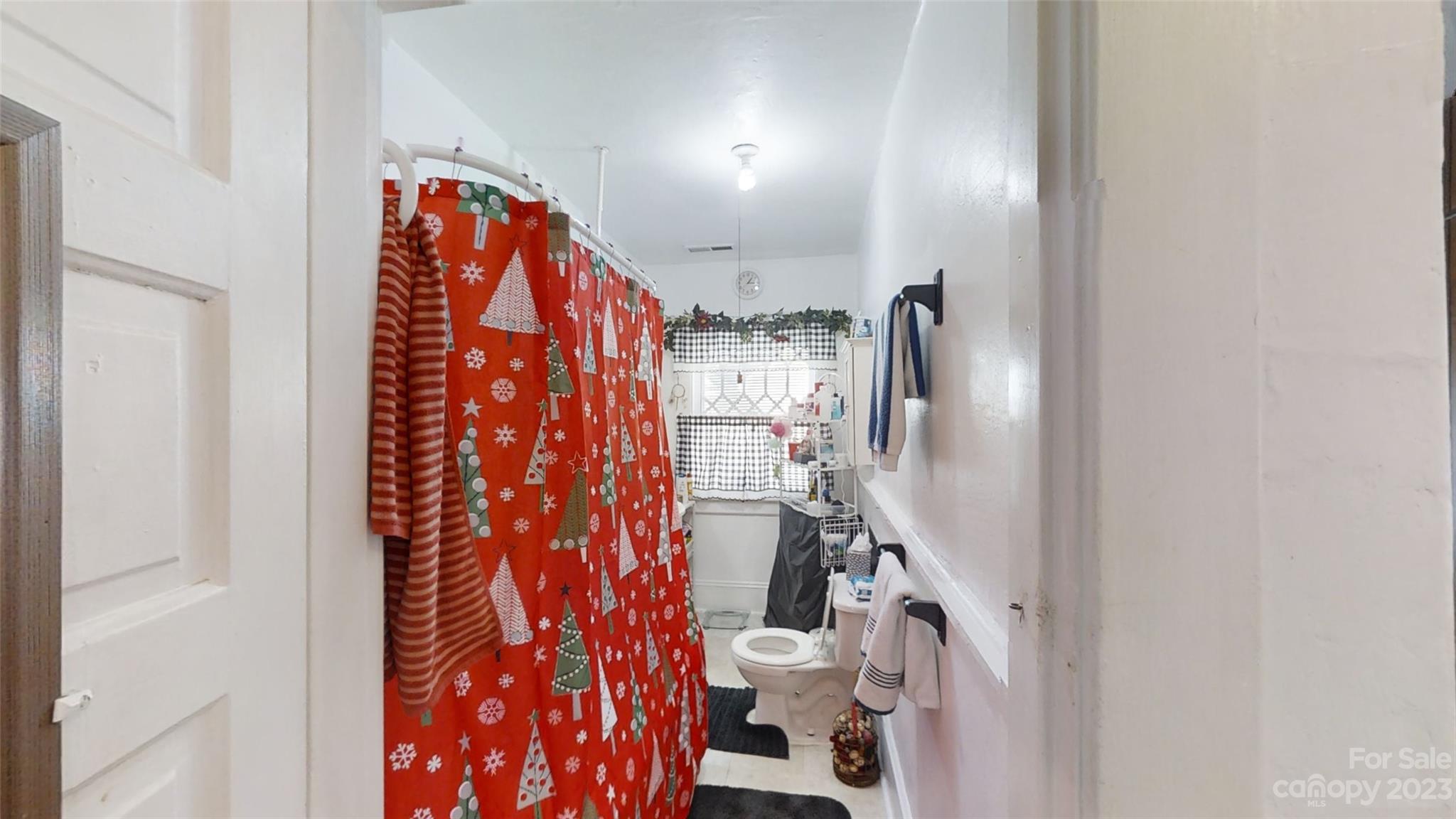 182 Flint Street Asheville, NC 28801 - Photo 20 of 22 a very nice looking room with a white door