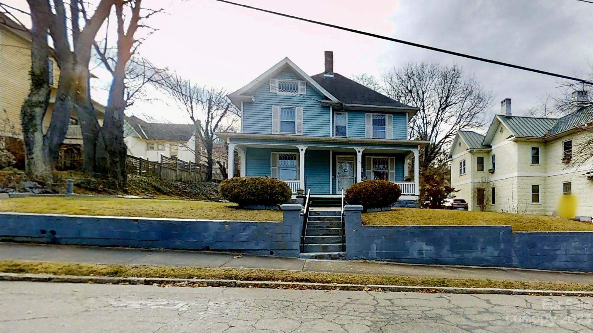 182 Flint Street Asheville, NC 28801 - Photo 2 of 22 a view of a house with swimming pool and sitting area