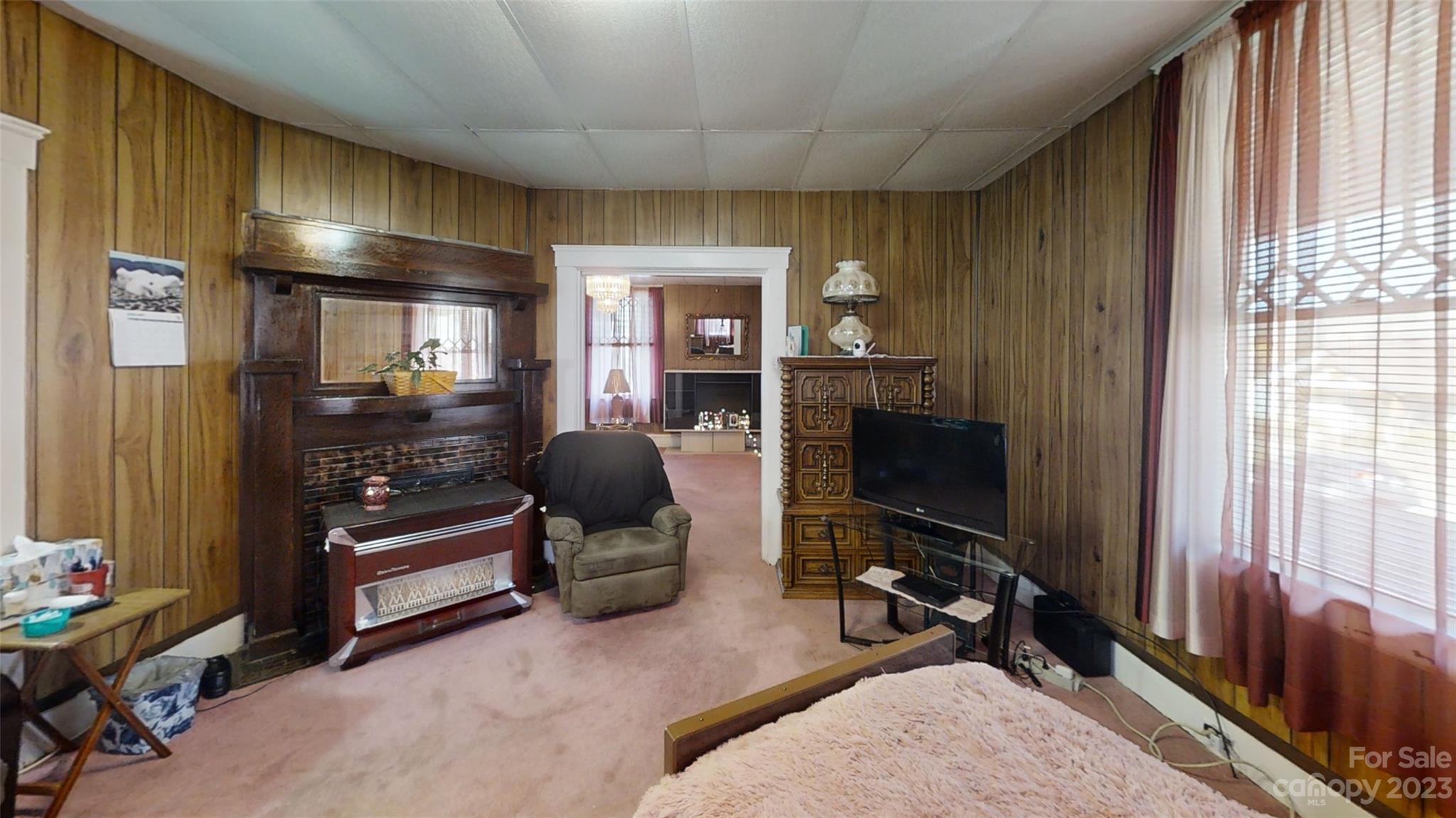 182 Flint Street Asheville, NC 28801 - Photo 9 of 22 a view of a livingroom with furniture and windows