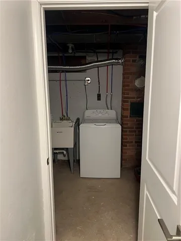 a view of a room with a large window