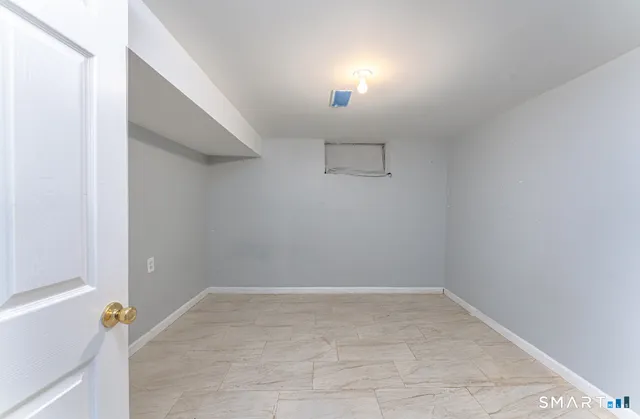 a view of a room with an empty space