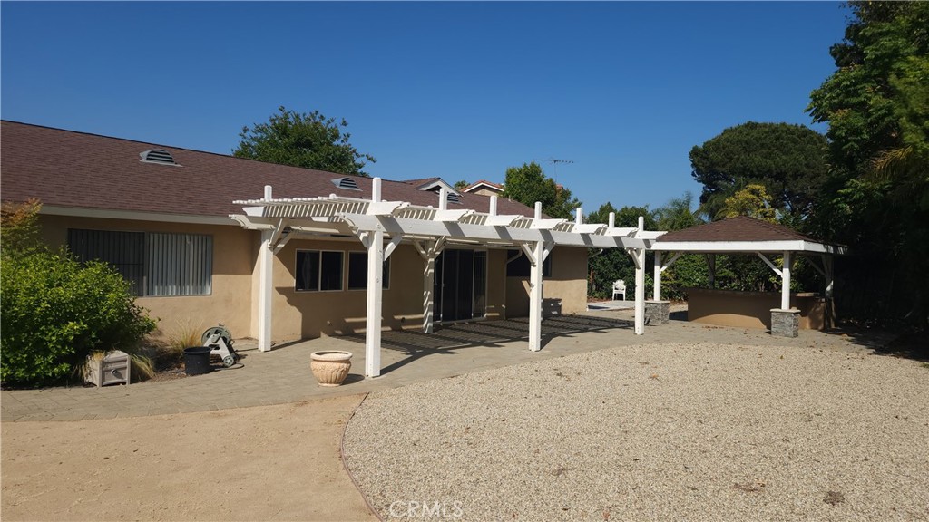 1617 Sunset Lane Fullerton, CA 92833 - Photo 15 of 18 a view of a house with backyard porch and sitting area
