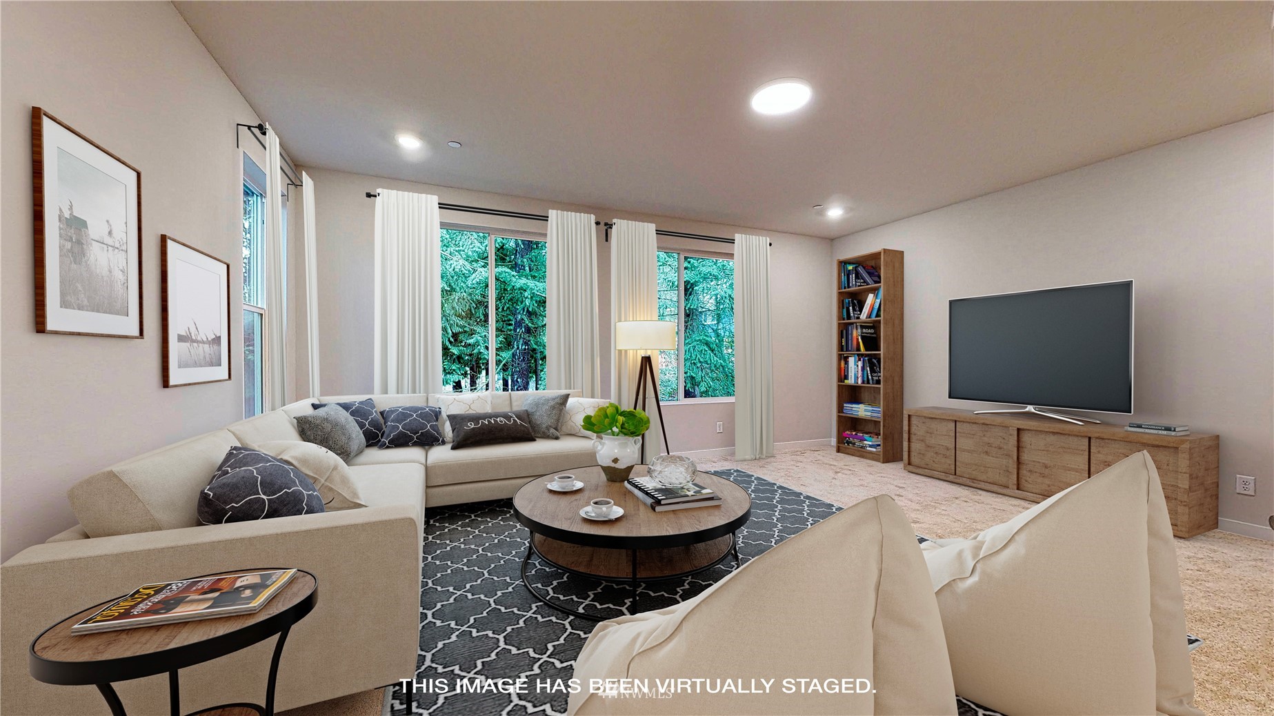 28 215th Street Southeast Bothell, WA 98021 - Photo 11 of 25 a living room with furniture and a flat screen tv