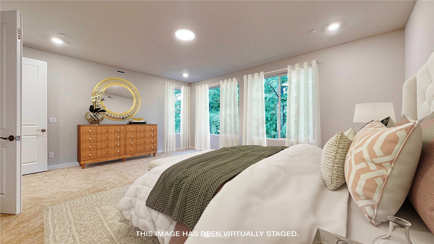 28 215th Street Southeast Bothell, WA 98021 - Photo 13 of 25 a spacious bedroom with a bed and window