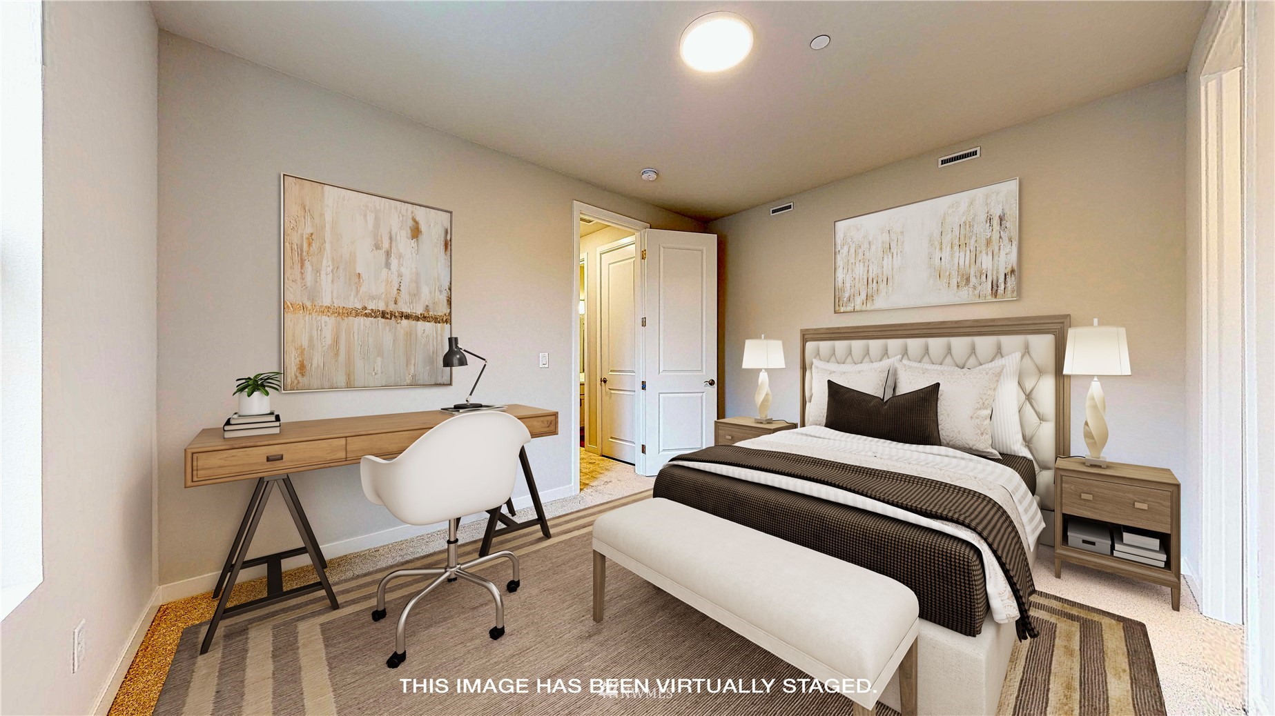 28 215th Street Southeast Bothell, WA 98021 - Photo 17 of 25 a bedroom with a bed a chair and painting on the wall