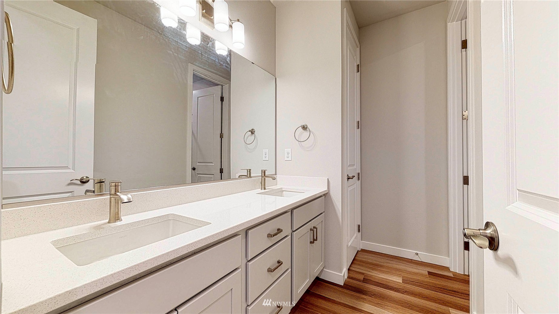 28 215th Street Southeast Bothell, WA 98021 - Photo 18 of 25 a bathroom with a sink and a mirror