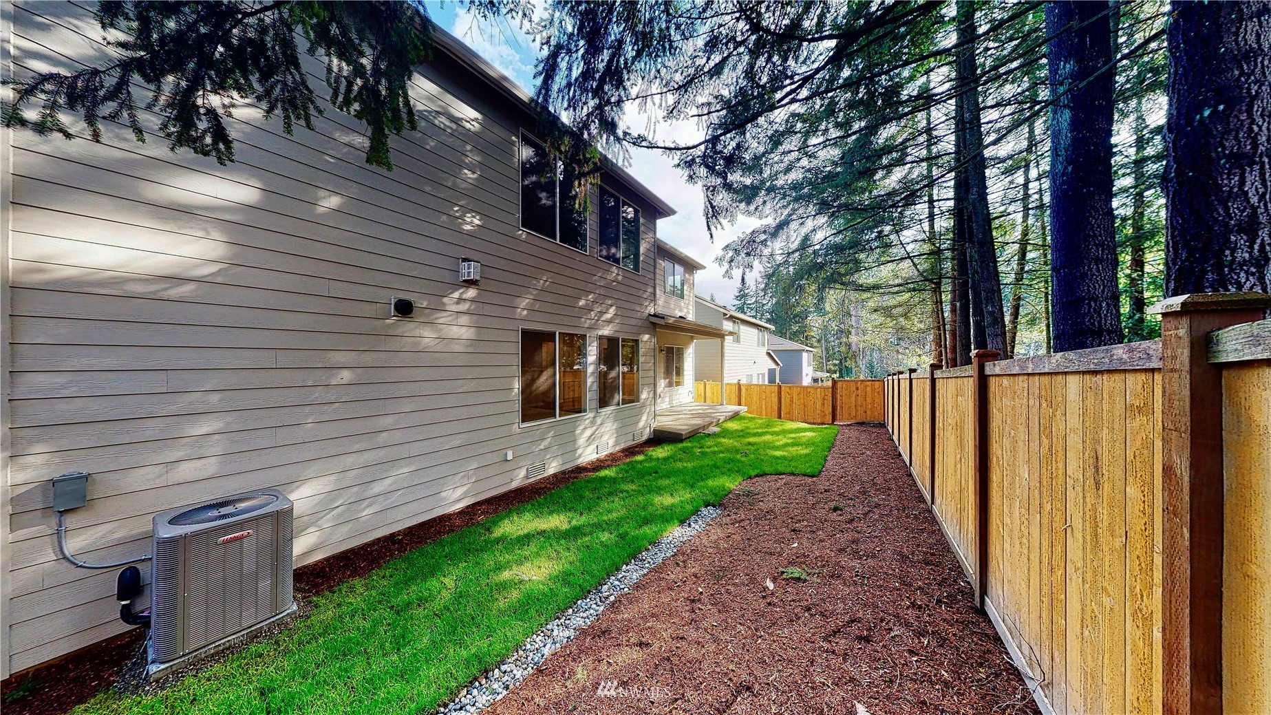 28 215th Street Southeast Bothell, WA 98021 - Photo 22 of 25 a view of a house with a yard