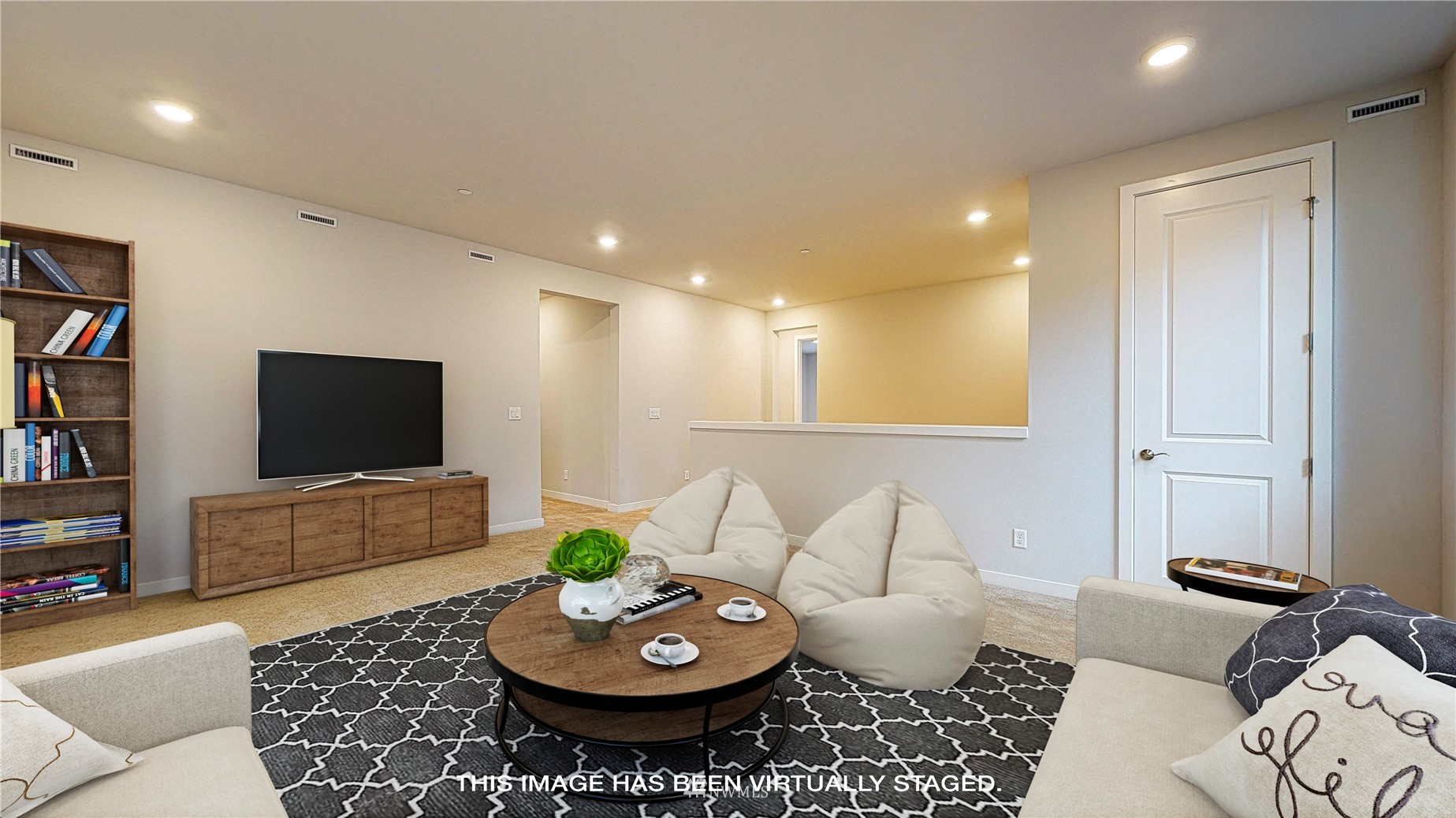 28 215th Street Southeast Bothell, WA 98021 - Photo 10 of 25 a living room with furniture and a flat screen tv