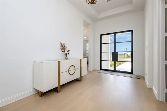 a view of cabinets with wooden floor