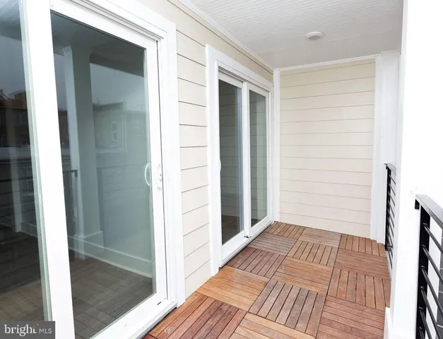 a view of roof deck with seating space