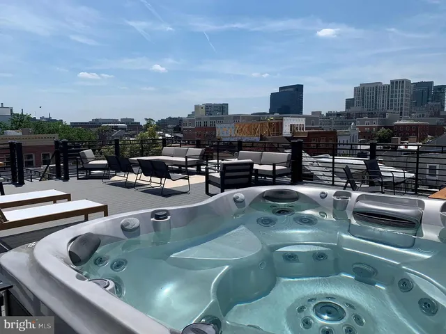 a view of a terrace with seating area