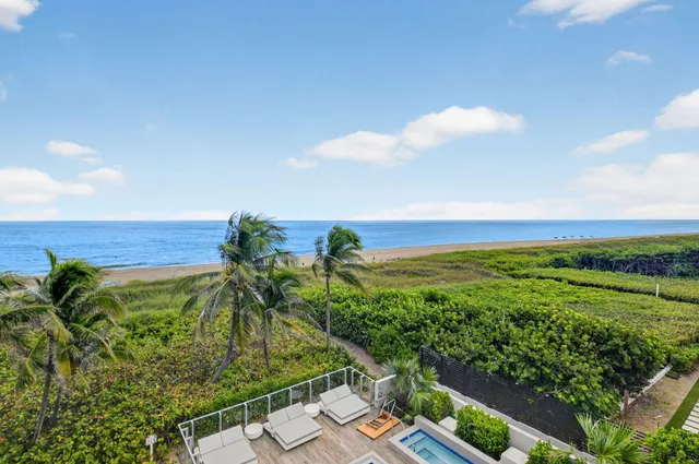 a bedroom with furniture and a chandelier