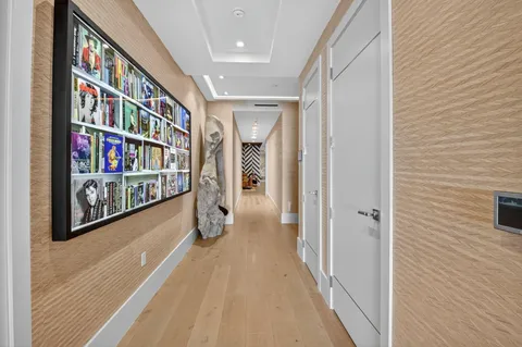 a kitchen with stainless steel appliances granite countertop a stove and a refrigerator