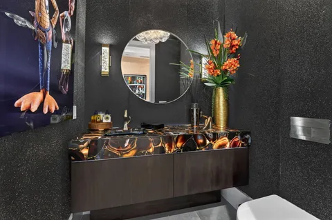 a utility room with sink dryer and washer