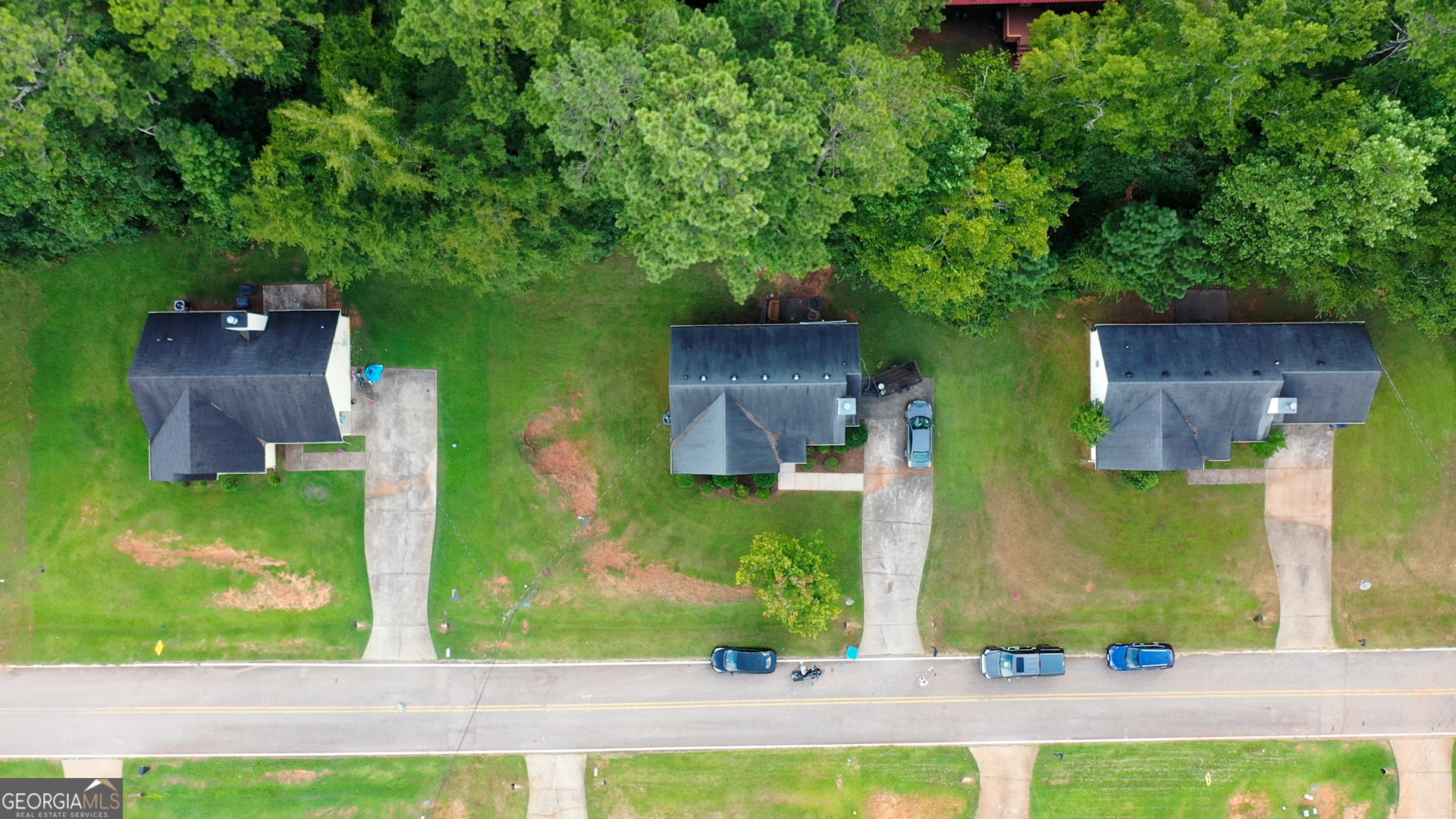 253 Nancy Street Monticello, GA 31064 - Photo 2 of 34 an aerial view of a house with a yard