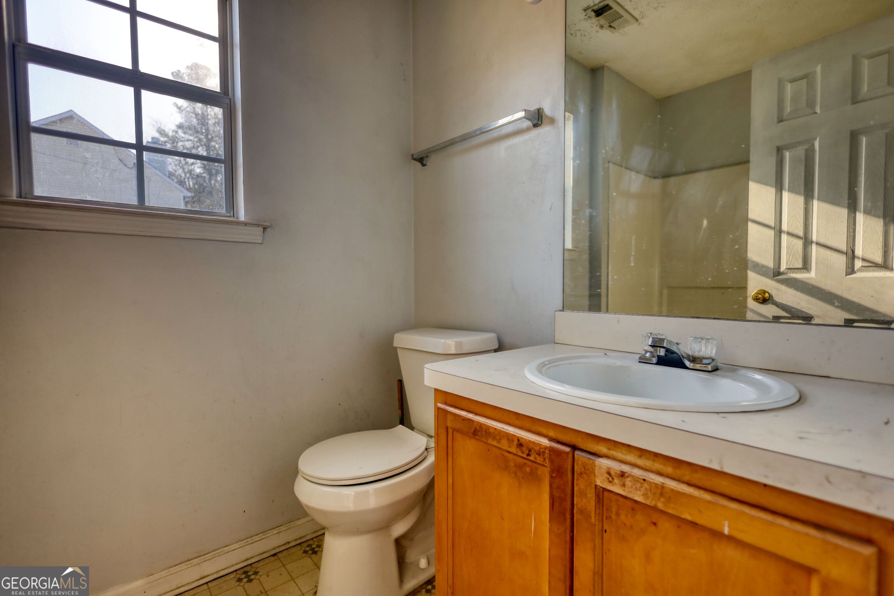 253 Nancy Street Monticello, GA 31064 - Photo 26 of 34 a bathroom with a sink and a toilet