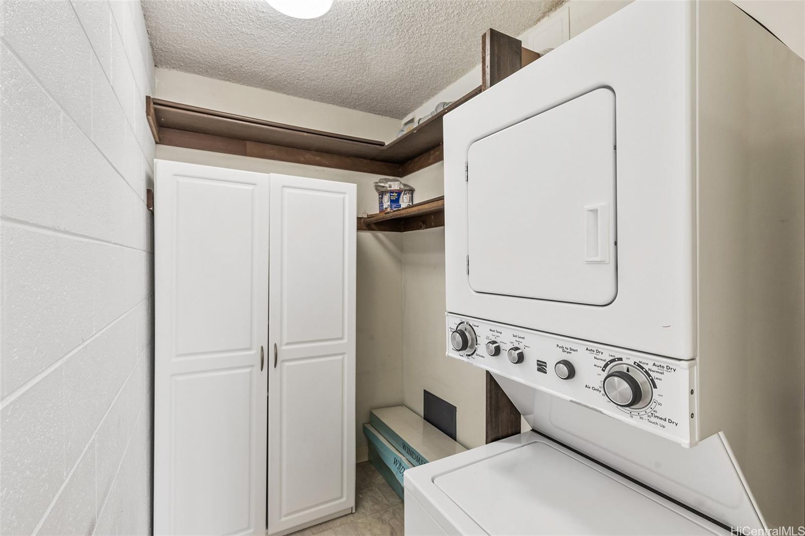 1415 Punahou Street, Unit 502 Honolulu, HI 96822 - Photo 9 of 17 Laundry in primary bedroom closet.