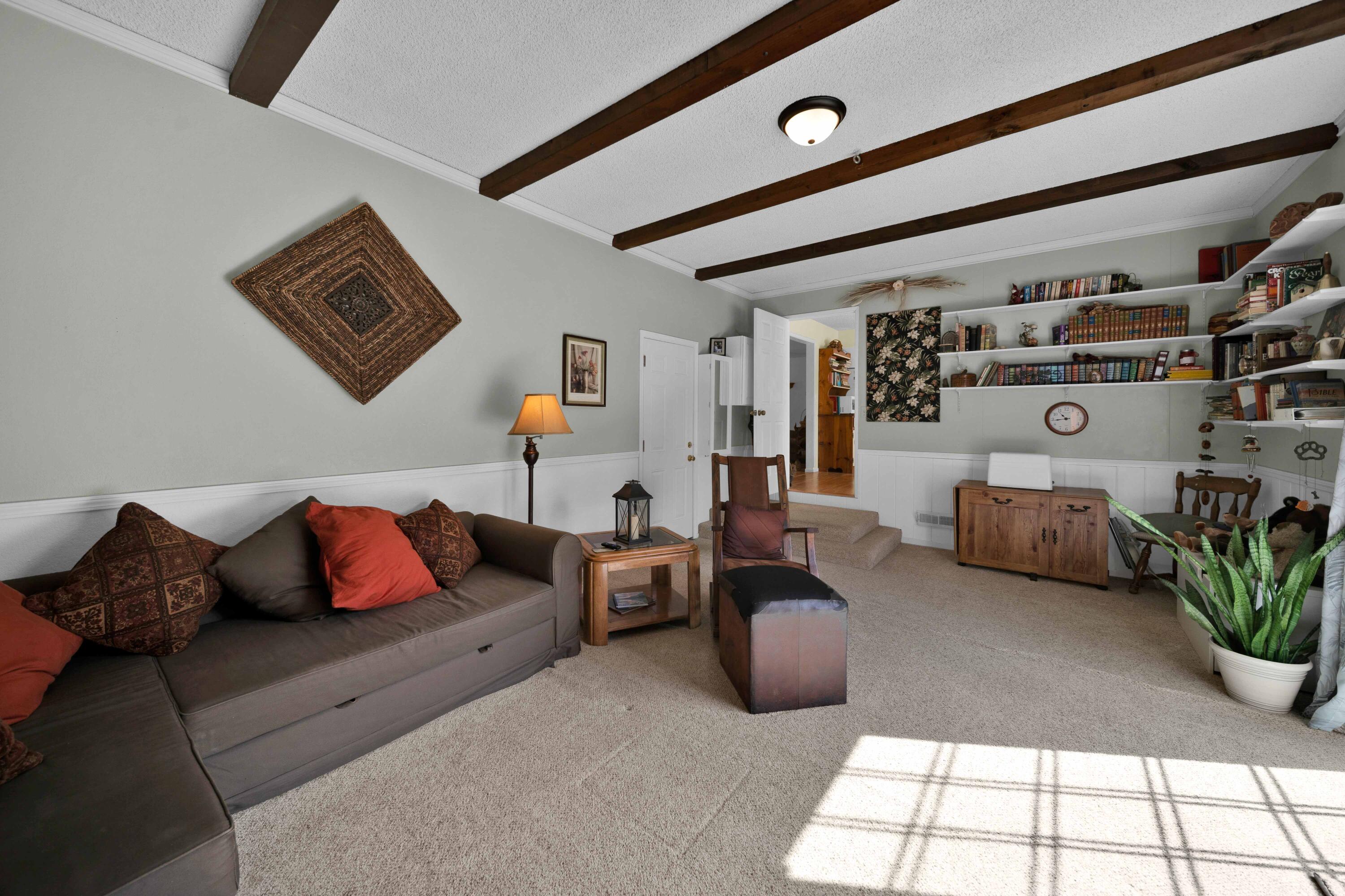 2195 Rancho Road Redding, CA 96002 - Photo 19 of 47 a bedroom with furniture and a couch