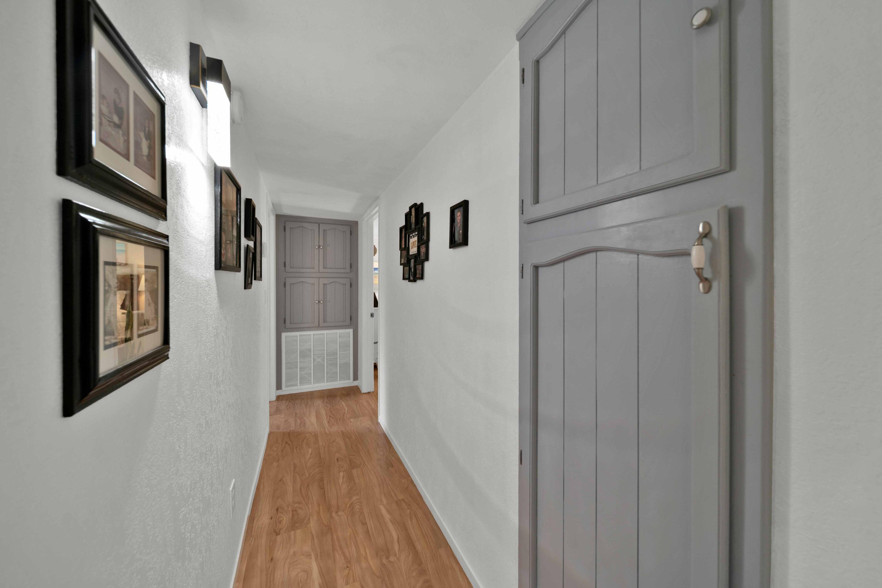 2195 Rancho Road Redding, CA 96002 - Photo 21 of 47 a view of a hallway with wooden floor and staircase