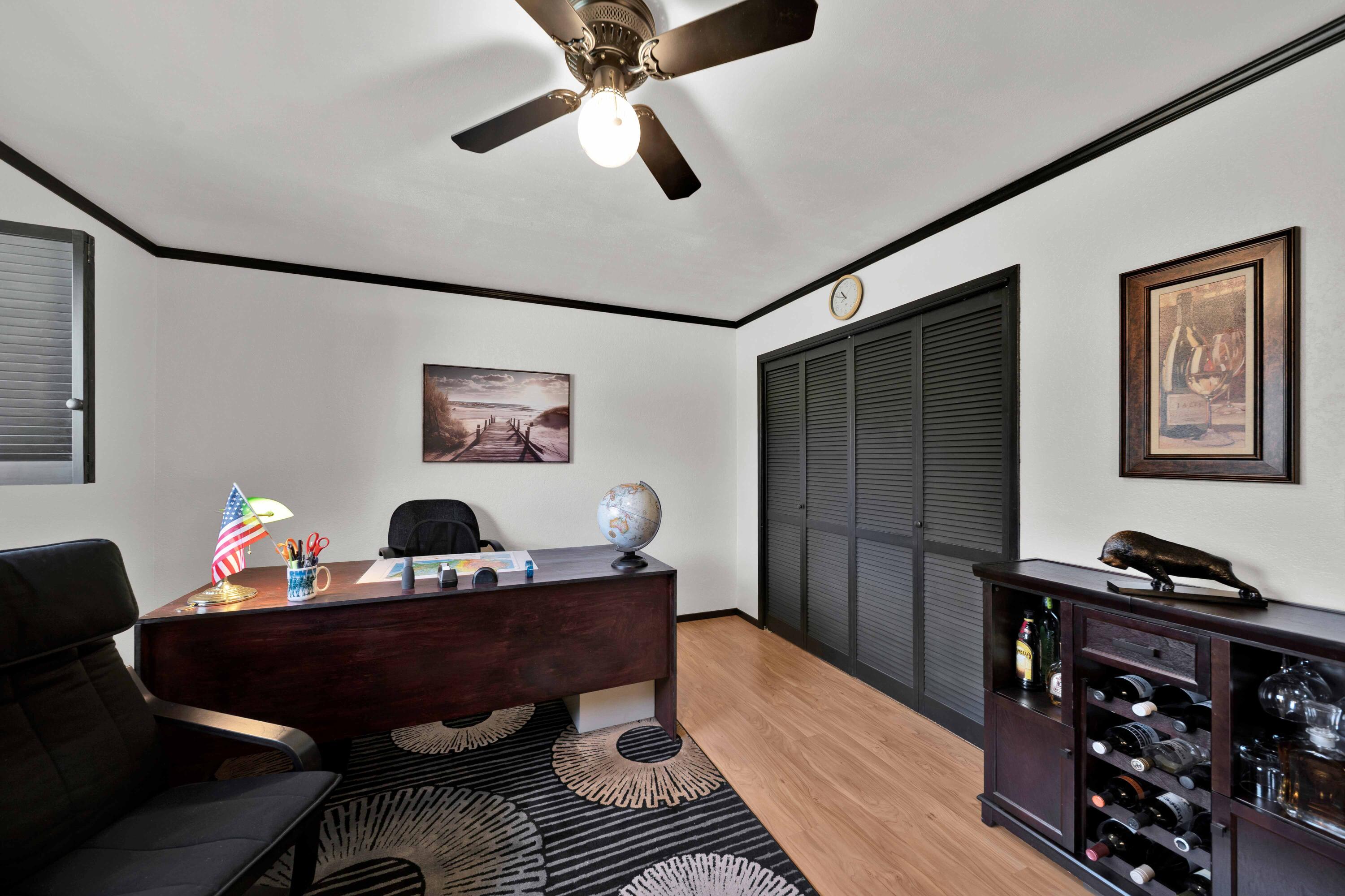 2195 Rancho Road Redding, CA 96002 - Photo 29 of 47 a work room with furniture and wooden floor