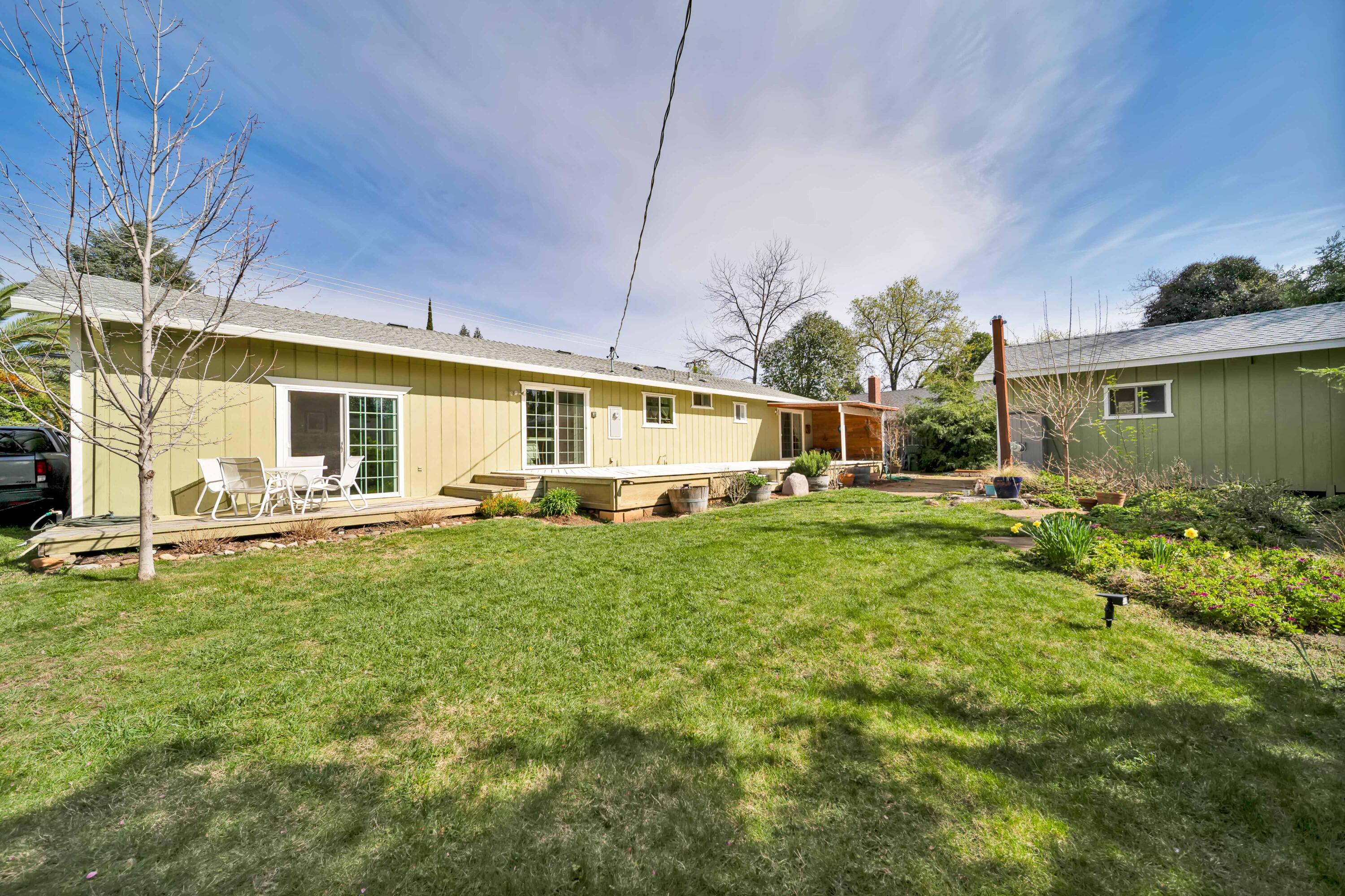 2195 Rancho Road Redding, CA 96002 - Photo 41 of 47 a front view of a house with a garden