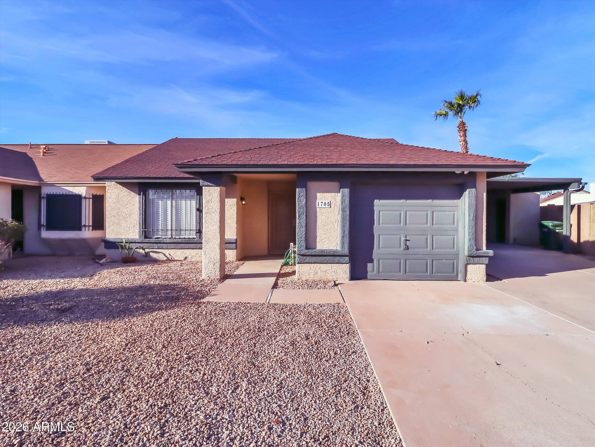 1705 East Grandview Road Phoenix, AZ 85022 - Photo 1 of 19 a house view with a outdoor space