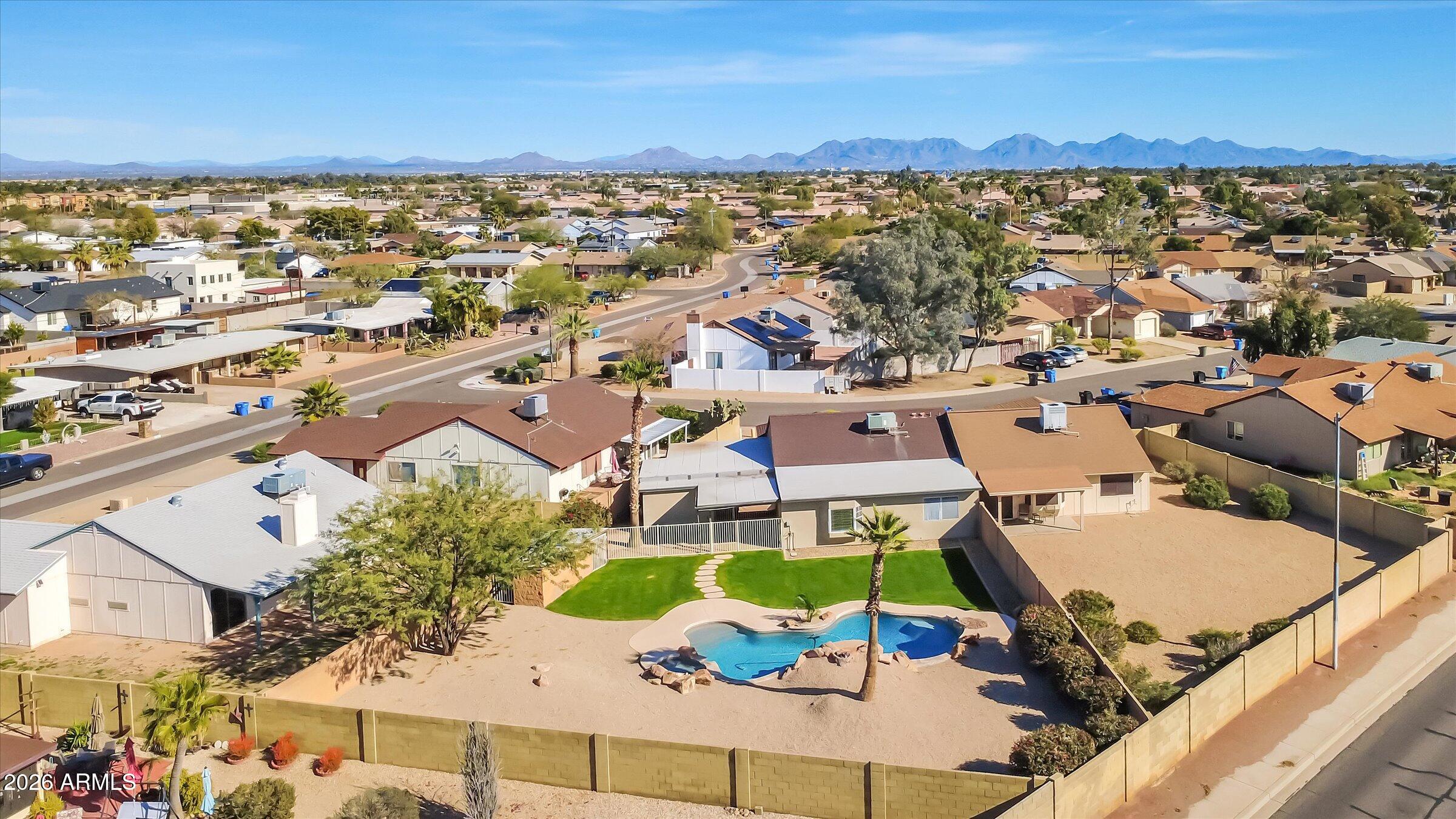 1705 East Grandview Road Phoenix, AZ 85022 - Photo 19 of 19 an aerial view of a houses with a swimming pool