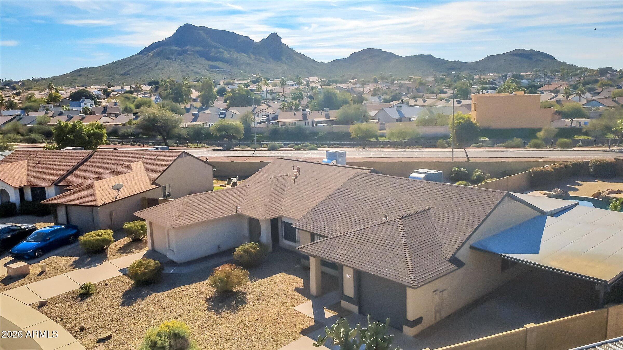 1705 East Grandview Road Phoenix, AZ 85022 - Photo 3 of 19 an aerial view of residential houses with outdoor space
