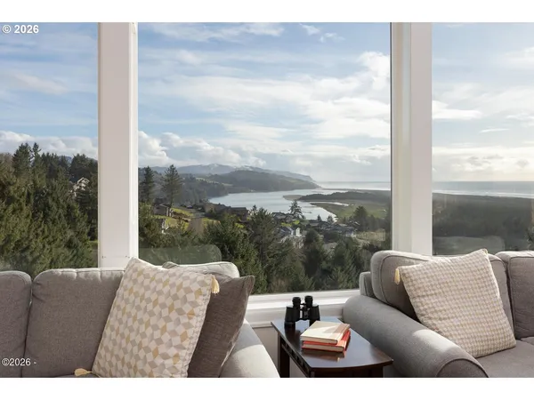 a view of balcony with couches