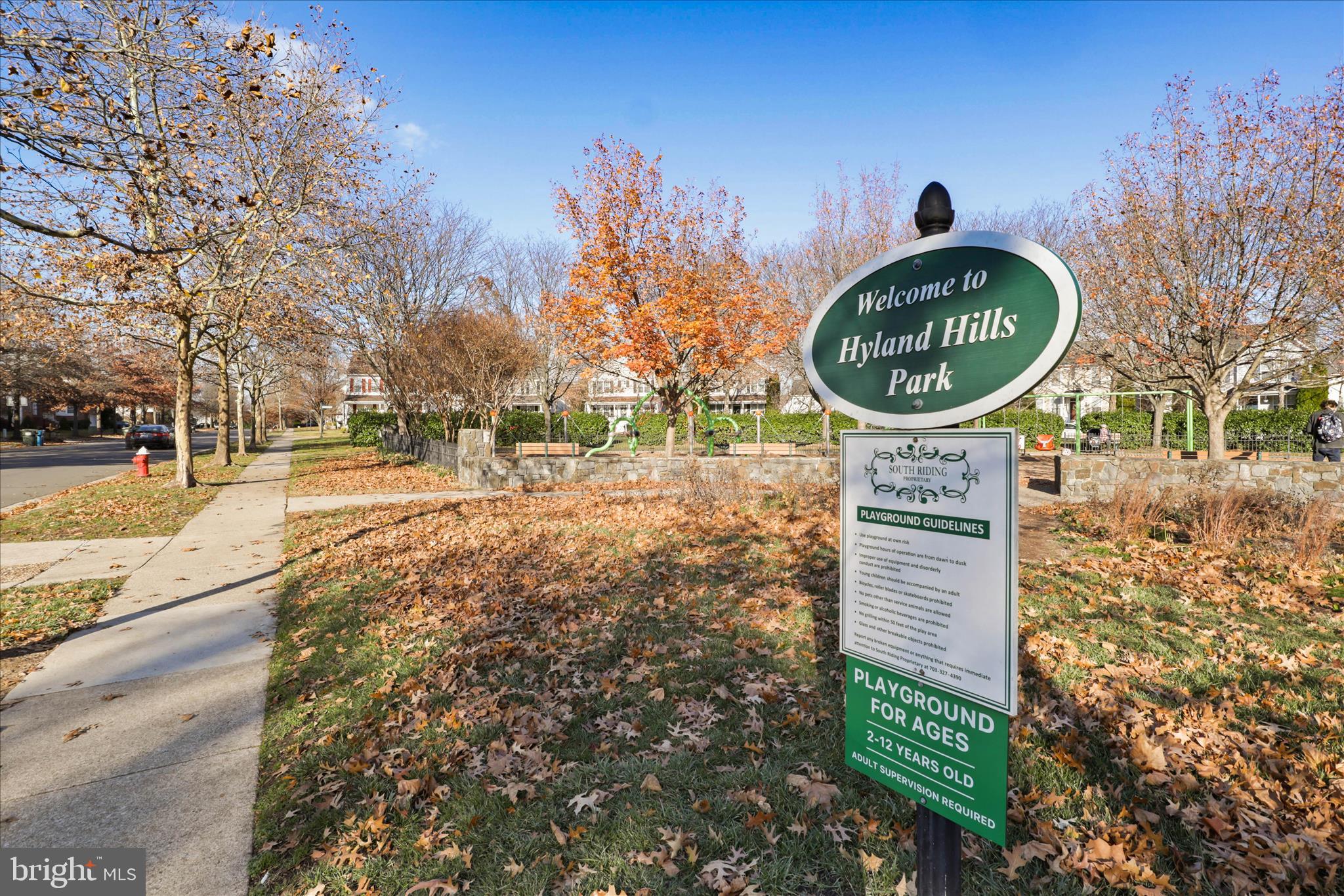 25352 Ripleys Field Drive Chantilly, VA 20152 - Photo 36 of 54 a sign board with tall trees in the background